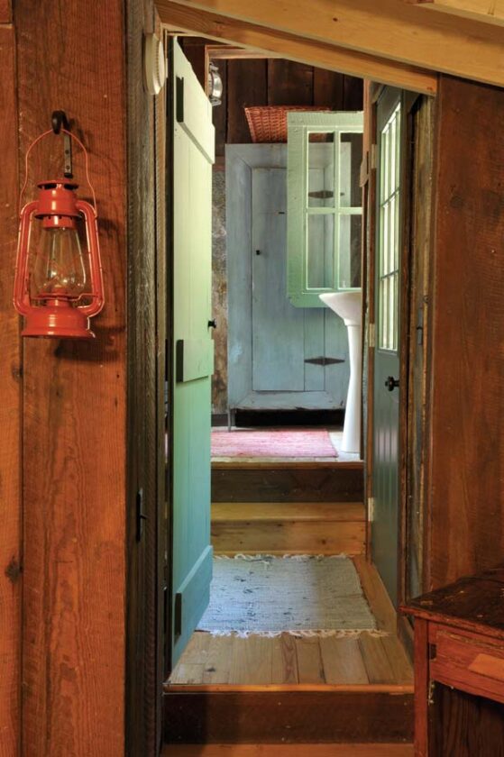 Salvaged wood, doors and windows give this home a charming, rustic feel.